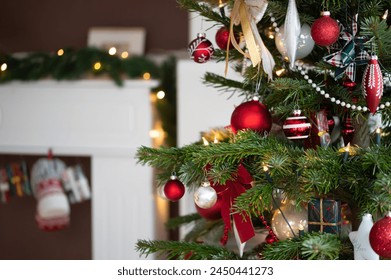 Decorated Christmas tree, real Nordmann fir in front of blurred living room furniture. Macro photography shows many different pendants in red, white and champagne. - Powered by Shutterstock