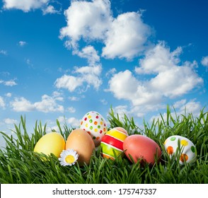 Decorated Easter Eggs In The Grass