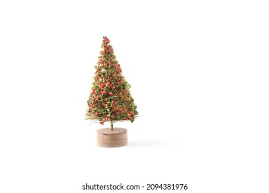 Decorated Fake Christmas Tree Isolated On White Background. Image Contains Copy Space