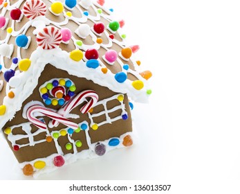 Decorated Gingerbread House On White Background.