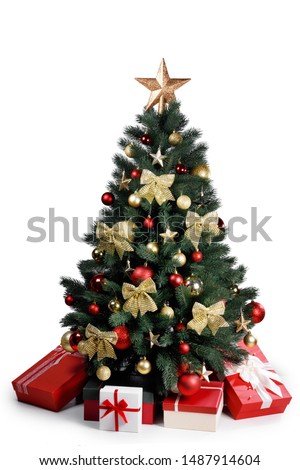 Decorated gold Christmas tree with presents for new year isolated on white background