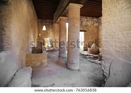 Decorated interior of acient roman house in Pompeii, city destriyed by volcano in 79AD in Italy