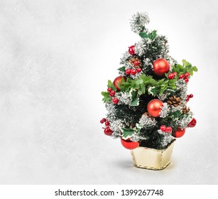 decorated mini christmas tree isolated, Clipping path included 
 - Powered by Shutterstock