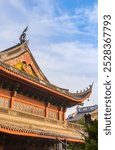 Decorated roof of the historic Lingyin Temple in Hangzhou, China