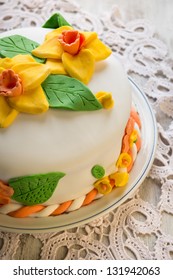 Decorated sweet layer cake with sugar fondant