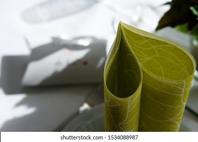 Decorated Table With Table Napkin Folded In Heard Shape