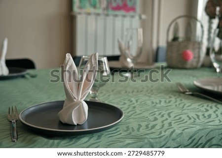 Decorated table served for Easter dinner