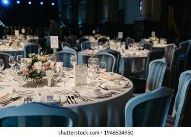 Decorated Table In A Wedding Ballroom In White And Light Blue Colours