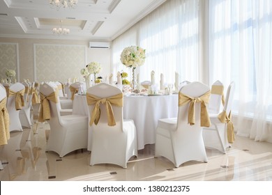 Decorated wedding banquet hall in classic style. Restaurant interior for banquet, wedding deco