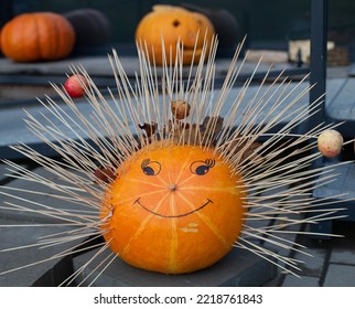 Decorating Autumn Pumpkins At Home. Traditional Thanksgiving And Halloween Decor. Goods Of The Autumn