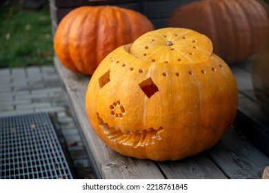 Decorating Autumn Pumpkins At Home. Traditional Thanksgiving And Halloween Decor. Goods Of The Autumn