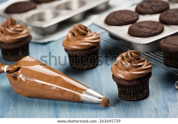 Decorating Chocolate Cupcakes Frosting Pastry Bag Stock Photo