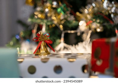 Decorating a Christmas tree to prepare for the Christmas and New Year festivities. - Shutterstock ID 2394545089