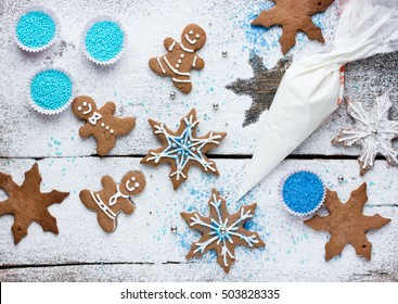 Decorating Gingerbread Man And Snowflake Christmas Cookie Background, Christmas Treats For Kids Cooking Process Concept