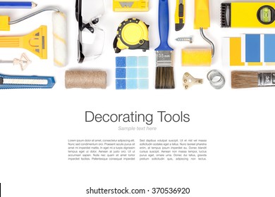 Decorating And House Renovation Tools And Accessories On White Background. Flat Lay Composition In Yellow And Blue Colors With Copy Space