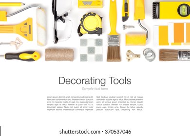 Decorating And House Renovation Tools And Accessories On White Background. Flat Lay Composition In Yellow Colors With Copy Space