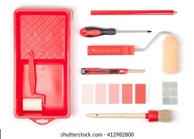 Decorating And House Renovation Tools On White Background. Painter And Decorator Work Table. Flat Lay Composition In Red Colors Top View