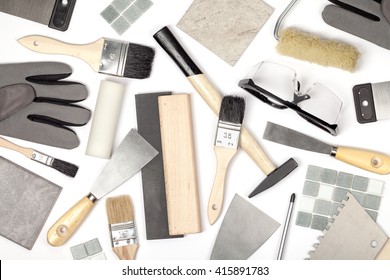 Decorating And House Renovation Tools On White Background. Painter And Decorator Working Table. Creative Mess Composition Top View