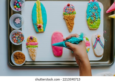 Decorating Sugar Cookies With Colorful Icing 