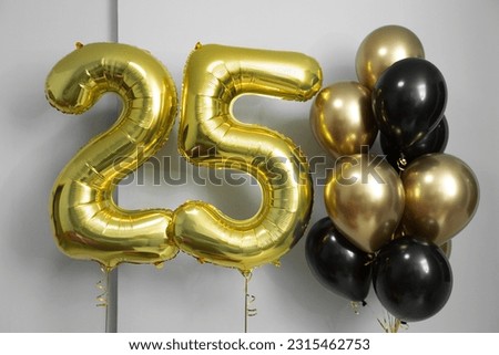 Decoration for the 25th birthday, anniversary. Helium balloons numbers