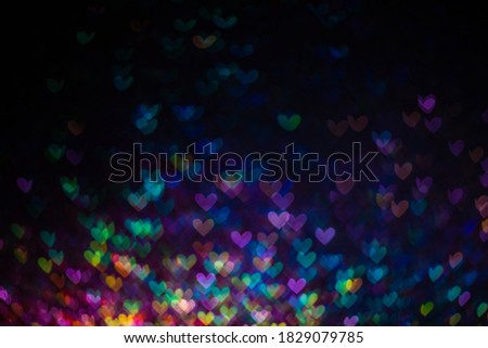 Decoration bokeh glitters background, abstract blurred backdrop with circles,modern design wallpaper with sparkling glimmers. Purple, blue and pink backdrop glittering sparks with blur effect.