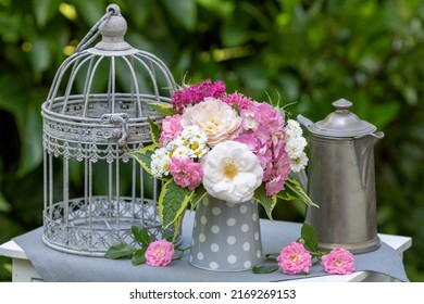 Decoration With Bouquet Of Summer Flowers, Vintage Coffee Can And Bird Cage