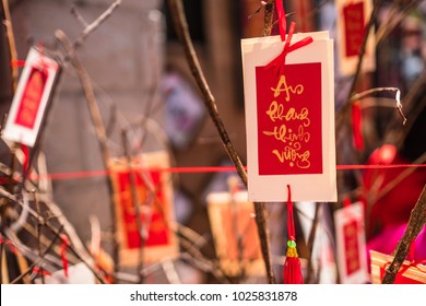 Decoration item on the tree branch with Vietnamese calligraphy text means " Wish Best Luck" for celebrating Lunar New Year. It's also called Tet holidays in Vietnam.
