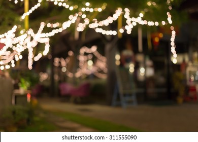 decoration light christmas celebration hanging on tree, abstract image blurred defocused background