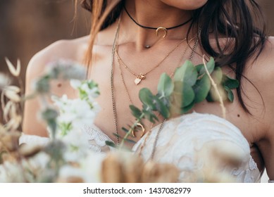  Close-up decoration on the neck of the bride in the style of rustic. 