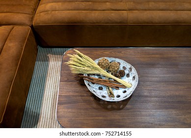 Decoration on the table with brown leather sofa in living room