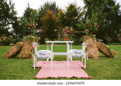 Decoration For Outdoor Wedding, Bride And Groom Signs On Altar Chairs.