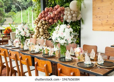 Decoration Of Party; A Long Table Decorated With Flowers For The Reception Of A Social Event.