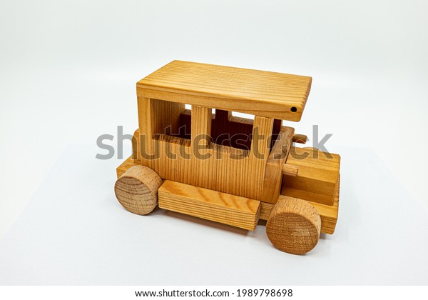 Decoration toy car carved\
from light wood