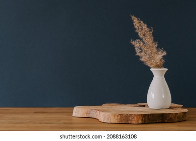 Decoration in vase on navy background with copy space