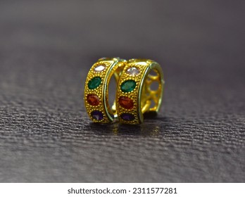decorations It's a gold earring decorated with gems. - Shutterstock ID 2311577281