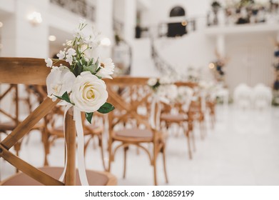 Decorations For Wedding Ceremony. Flower Set Up On Chair