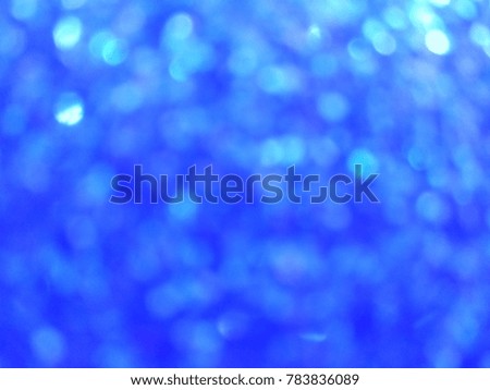 Decorative Abstract out of focus lights with abstract background of Blue color. Good for Diwali, Christmas and New Year celebrations. Abstract background of Blue and white color. 