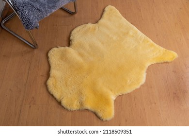 Decorative Animal Hide Rug On The Floor In Yellow