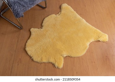 Decorative Animal Hide Rug On The Floor In Yellow