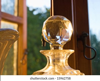 Decorative Antique Crystal Glass Bottle By A Window