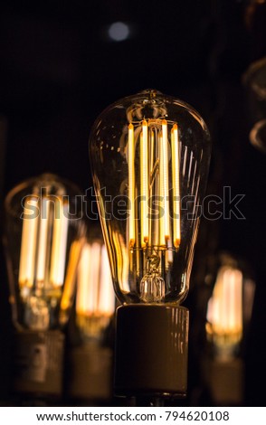 Decorative antique edison style light bulbs are in fact contamplorary LED light bulds made to look like old school. Creating old style look and saving energy