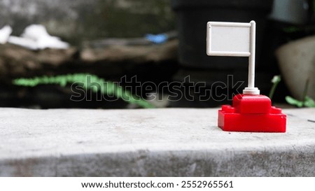 decorative background image of the right corner of a stacking toy with its top like a board model or a flag model