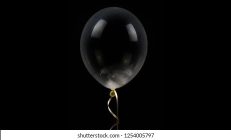 Decorative balloon with black background and gold ribbon - birthday wedding party celebration - decorative background