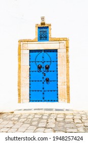 Decorative Blue Door. Typical Blue Studded Wood Or Iron Door In Sidi Bou Said, Tunisia, North Africa