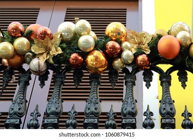 Decorative Christmas Balls Hanging On Iron Balcony, San Juan, Puerto Rico, Caribbean