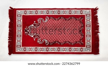 Decorative colourful prayer rug on white background