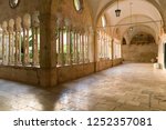 The decorative columns and arches of the corridors of the 13th Century Franciscan Monastery in Dubrovnik, Croatia.