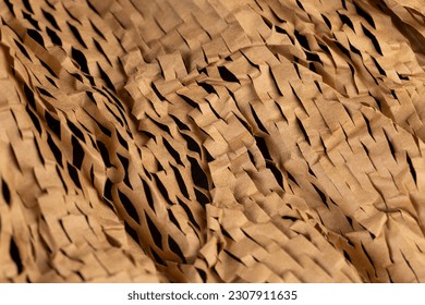 Decorative craft paper with cuts for packaging and decoration, decorative paper close-up is used to decorate flowers and other gifts - Shutterstock ID 2307911635