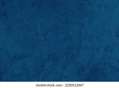 Decorative Dark Blue Painted Venetian plaster Wall Background. Beautiful Abstract Stucco Texture With Copy Space for design. Wall decor