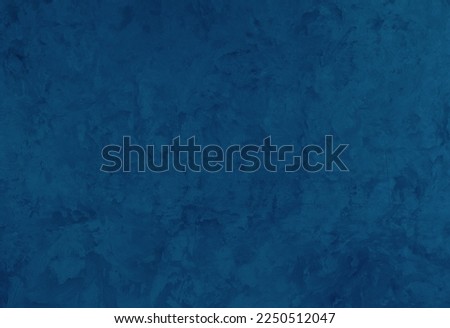 Decorative Dark Blue Painted Venetian plaster Wall Background. Beautiful Abstract Stucco Texture With Copy Space for design. Wall decor